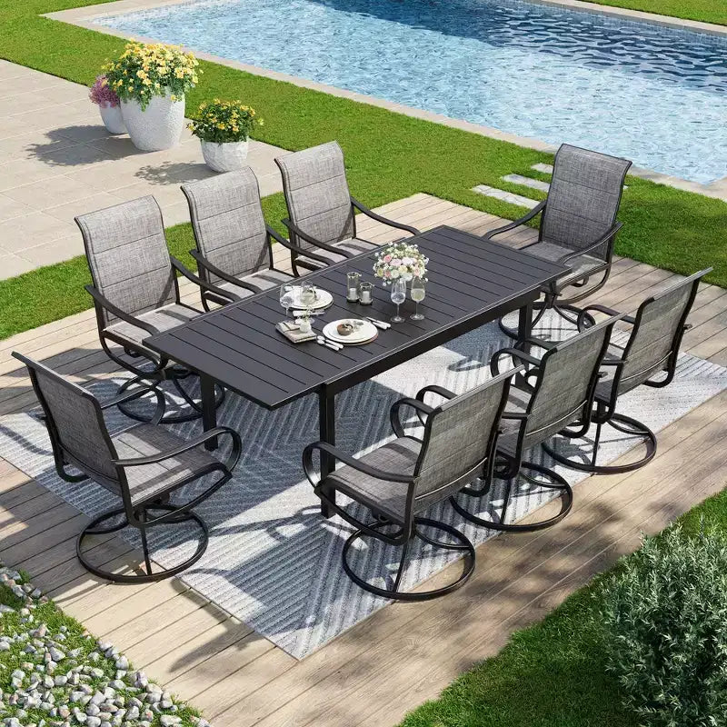 9-teiliges Terrassen-Esszimmerset „Captiva Designs“ mit rechteckigem, verstellbarem Stahltisch mit Lamellenplatte und gepolsterten drehbaren Textilene-Stühlen