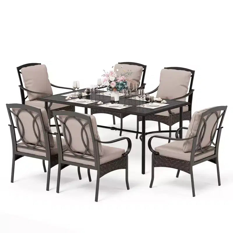 Captiva Designs 7-teiliges Essplatz-Set für die Terrasse mit rechteckigem Stahltisch und Metall-Armlehnstühlen aus Rattan
