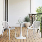 WestinTrends Playa 3-Piece Outdoor Round Metal Dining Table Set And Stackable Resin Patio Dining Side Chairs