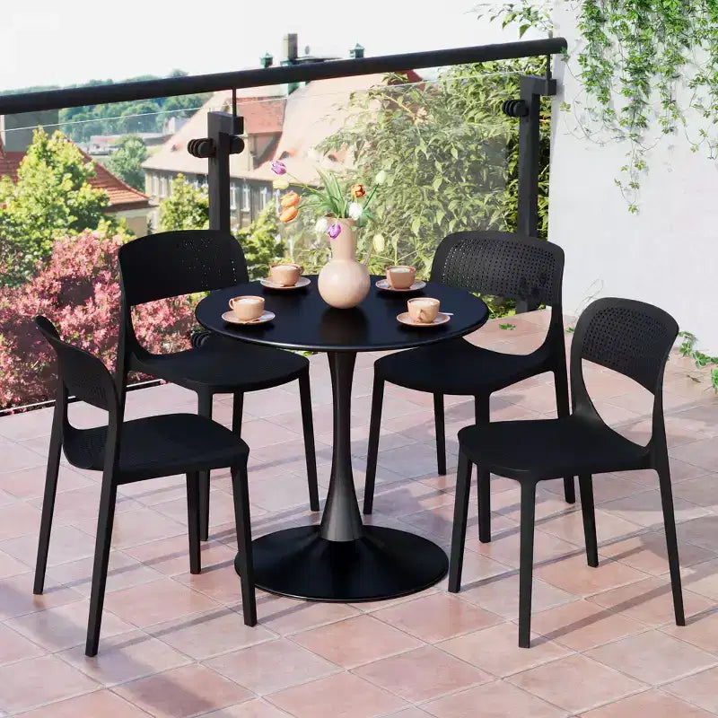 WestinTrends Playa 5-Piece Round Metal Bistro Dining Table Set And Stackable Resin Patio Dining Side Chairs