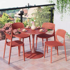 WestinTrends Playa 5-Piece Round Metal Bistro Dining Table Set And Stackable Resin Patio Dining Side Chairs