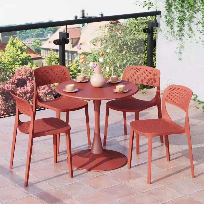WestinTrends Playa 5-Piece Round Metal Bistro Dining Table Set And Stackable Resin Patio Dining Side Chairs