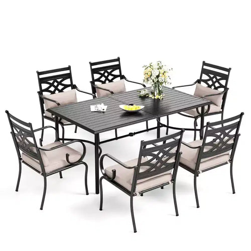 Tavolo da pranzo da esterno Captiva Designs da 7 pezzi con piano a doghe in acciaio e sedie in metallo con cuscini per seduta e cuscini lombari