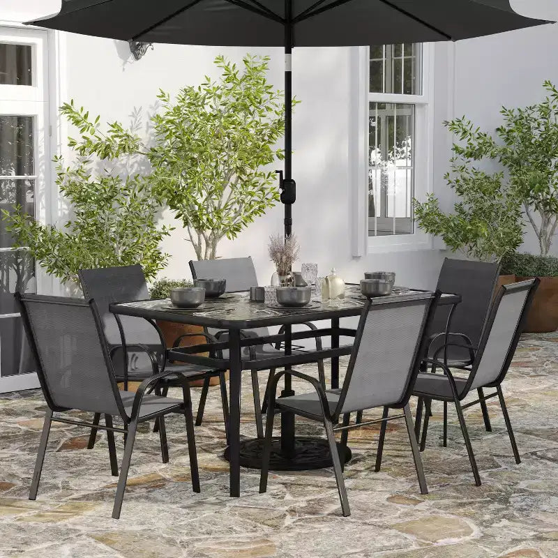 Merrick Lane 7 Piece Outdoor Dining Table Set for 6 with Glass-Top Patio Table and 6 Stack Chairs with Flex Comfort Material